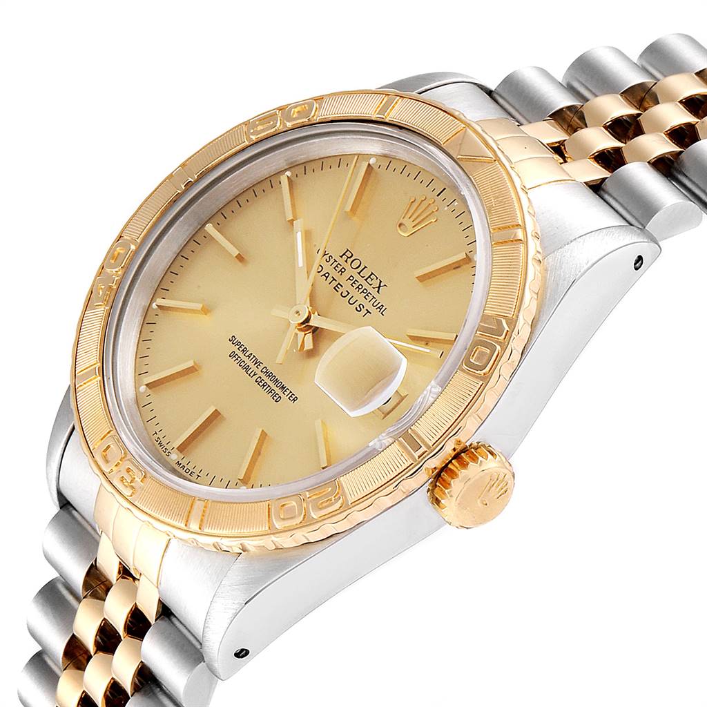 The image shows a close-up angle of a Rolex Turn-o-Graph 16263 Men
s Steel and Gold (two tone) Champagne Dial 16263 Men
s Steel and Gold (two tone) Champagne Dial, highlighting the bezel, dial, crown, and part of the bracelet.