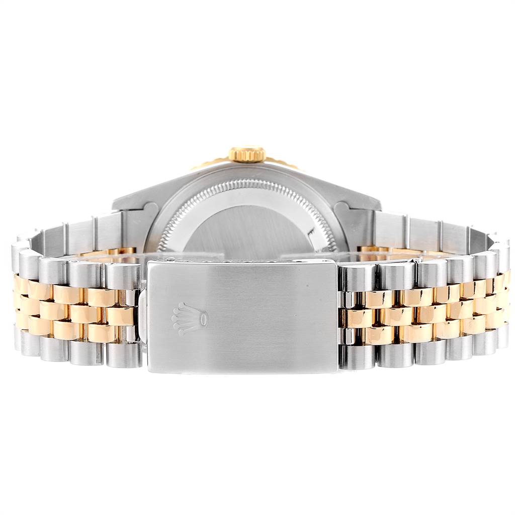 The image shows the clasp and case back of a Rolex Turn-o-Graph 16263 Men
s Steel and Gold (two tone) Champagne Dial 16263 Men
s Steel and Gold (two tone) Champagne Dial watch, viewed from the rear.