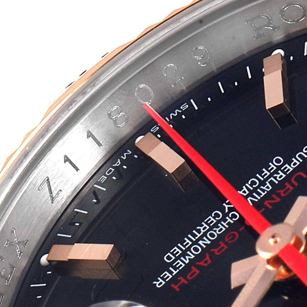 This image shows a close-up of the dial and bezel of a Rolex Turn-o-Graph 116261 Men
s Steel and Gold (two tone) Black Dial 116261 Men
s Steel and Gold (two tone) Black Dial watch, highlighting the numbering and red second hand.