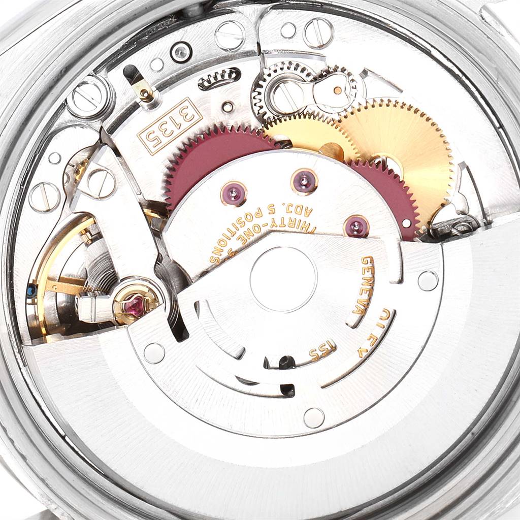 This image shows the internal mechanism of a Rolex Turn-o-Graph 116264 Men
s Stainless Steel White Dial 116264 Men
s Stainless Steel White Dial watch from a close-up angle, highlighting gears and movement parts.