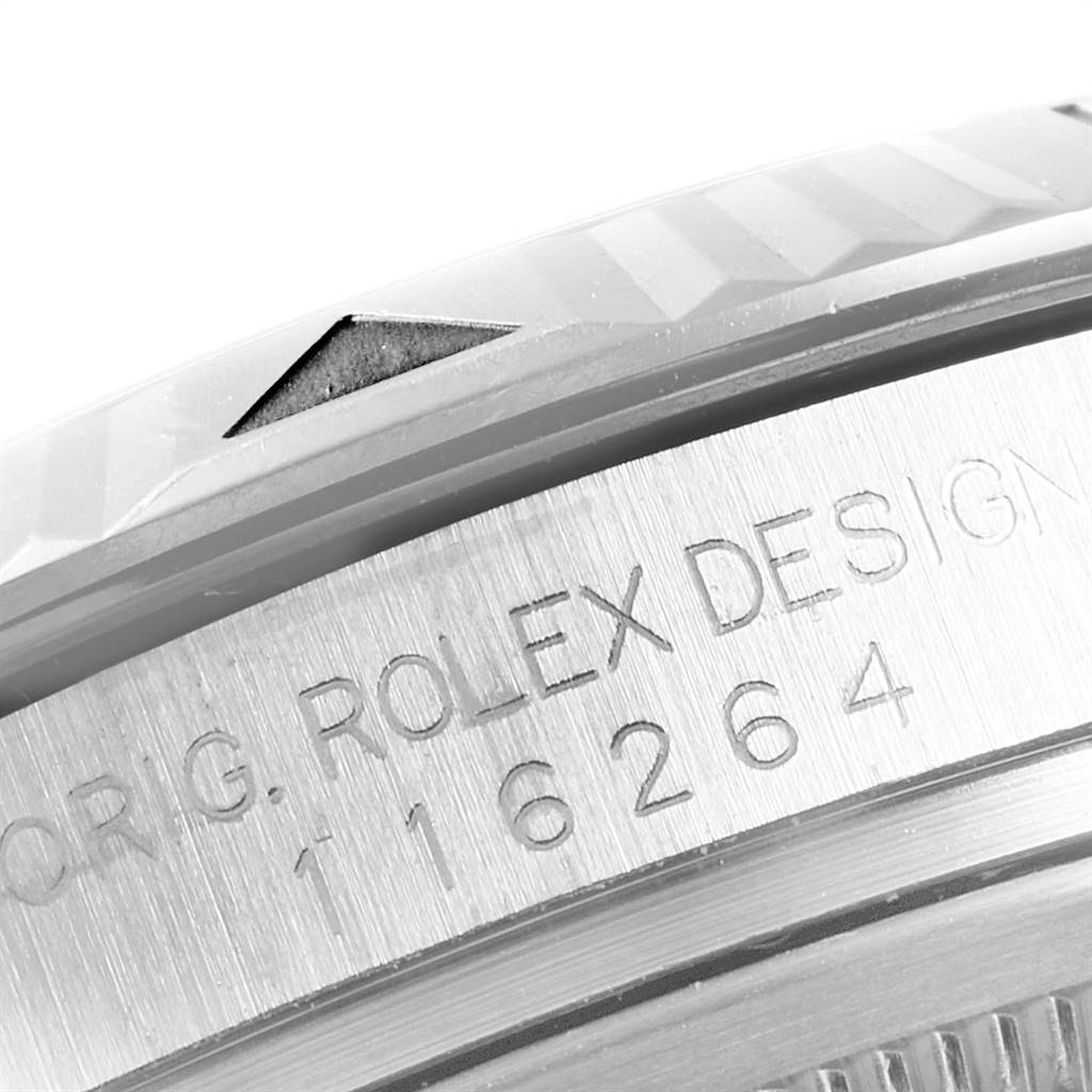 This close-up image shows the bezel and part of the casing of a Rolex Turn-o-Graph 116264 Men's Stainless Steel White Dial 116264 Men's Stainless Steel White Dial, highlighting the model number and "ROLEX DESIGN" engraving.