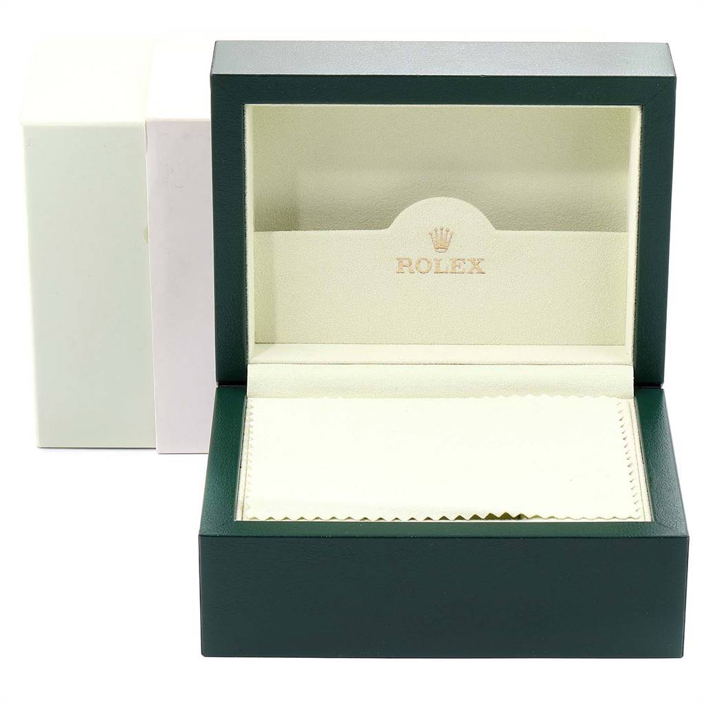 This image shows an open green Rolex box for the Turn-o-Graph model, sans the watch and with its packaging.