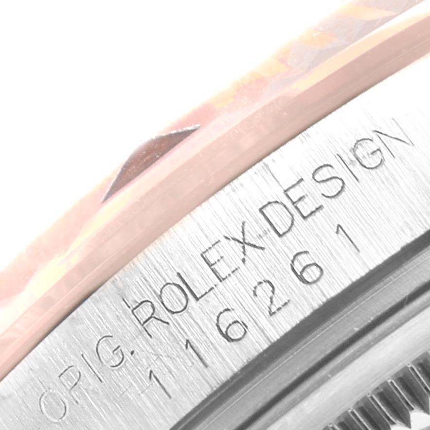 This image shows a close-up view of the model and serial number engraving on the bezel of a Rolex Turn-o-Graph 116261 Men's Stainless Steel Silver Dial 116261 Men's Stainless Steel Silver Dial watch.