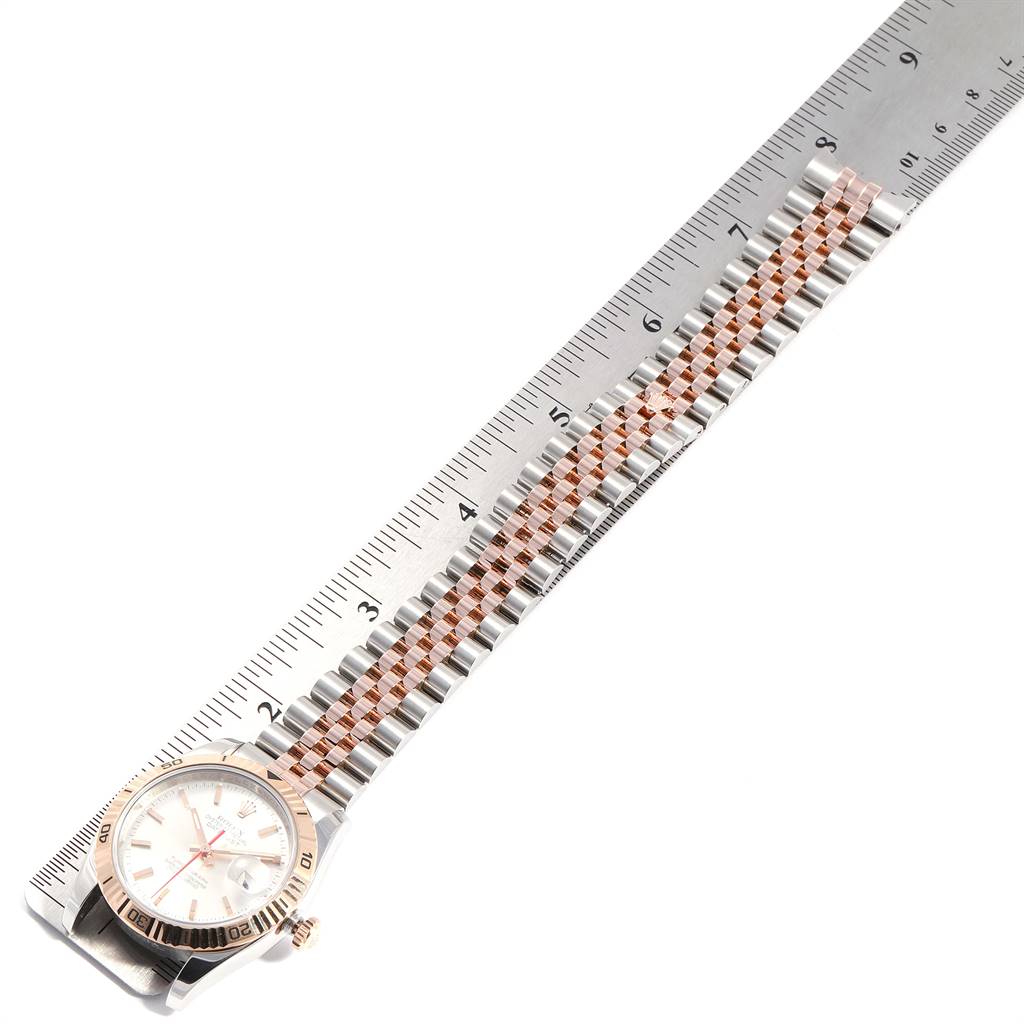 The image shows a Rolex Turn-o-Graph 116261 Men's Stainless Steel Silver Dial 116261 Men's Stainless Steel Silver Dial watch lying flat next to a ruler, displaying the face and entire band.