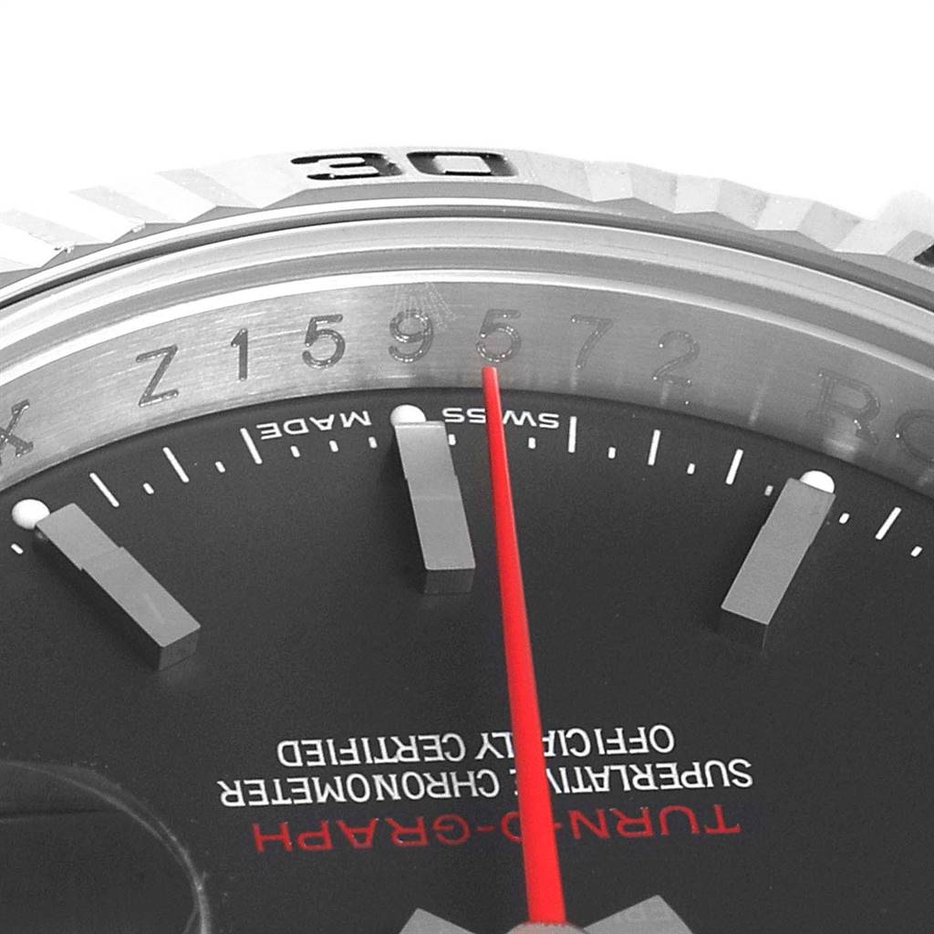 The image shows an up-close view of the bezel, dial, and second hand of a Rolex Turn-o-Graph 116264 Men
s Stainless Steel Black Dial 116264 Men
s Stainless Steel Black Dial model.