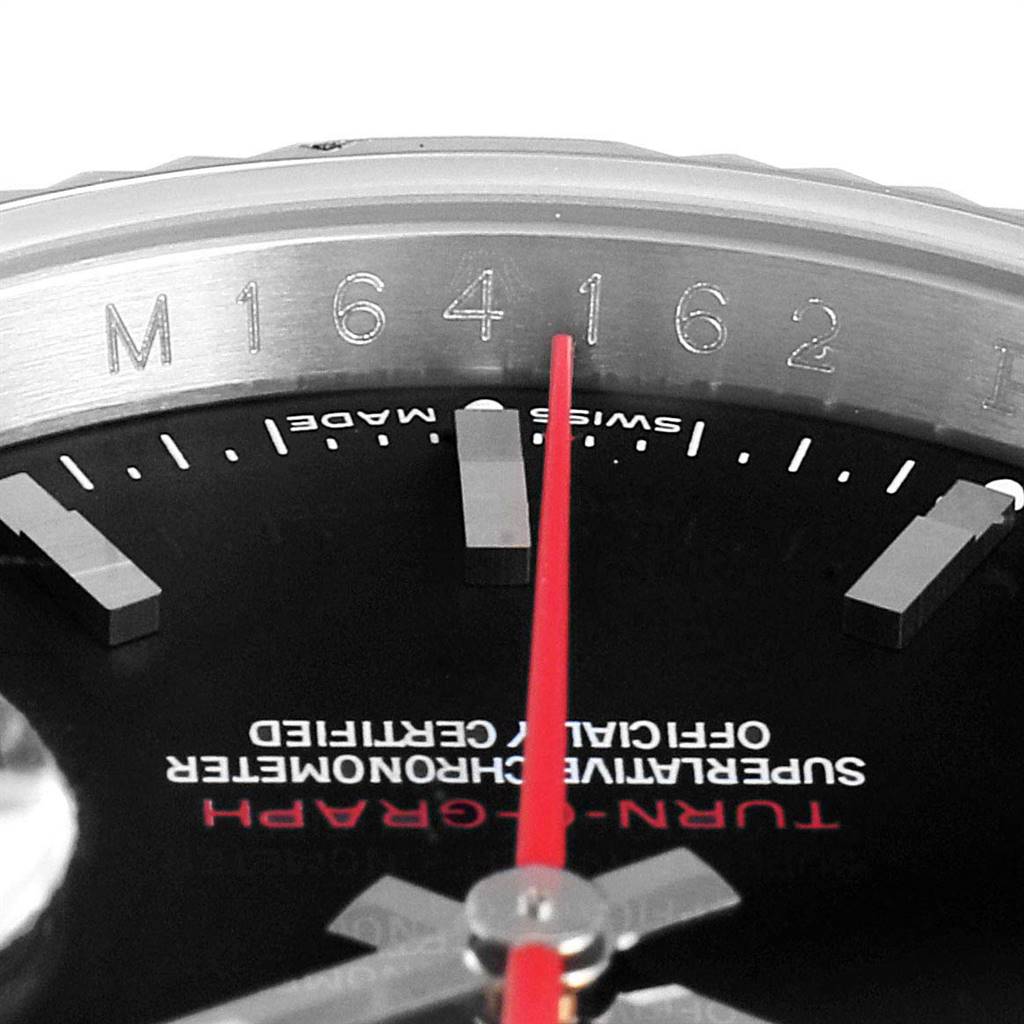 The close-up shows the dial, red seconds hand, applied hour markers, and part of the bezel with the model number of the Rolex Turn-o-Graph 116264 Men
s Stainless Steel Black Dial 116264 Men
s Stainless Steel Black Dial.