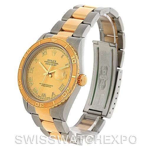 This image shows a Rolex Turn-o-Graph 16233 Men's Steel and Gold (two tone) Champagne Dial 16233 Men's Steel and Gold (two tone) Champagne Dial watch angled to display the dial, bezel, crown, and partially open bracelet.