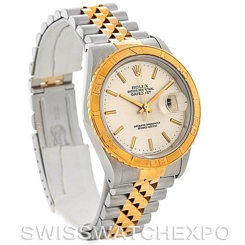 This image shows a Rolex Turn-o-Graph 16263 Men's Steel and Gold (two tone) Silver Dial 16263 Men's Steel and Gold (two tone) Silver Dial watch from an angle highlighting its dial, bezel, and two-tone bracelet.