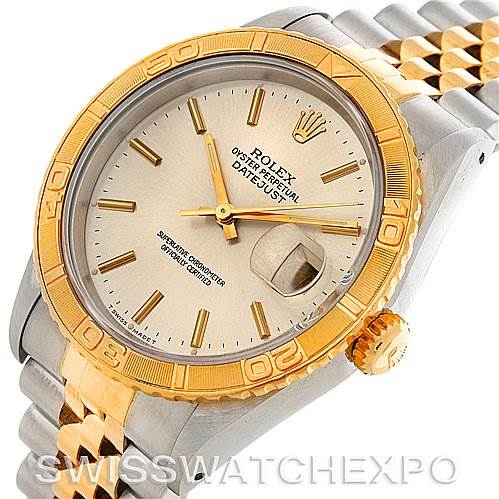 The image shows a Rolex Turn-o-Graph 16263 Men's Steel and Gold (two tone) Silver Dial 16263 Men's Steel and Gold (two tone) Silver Dial watch primarily highlighting the dial, bezel, and part of the bracelet from an angled top view.