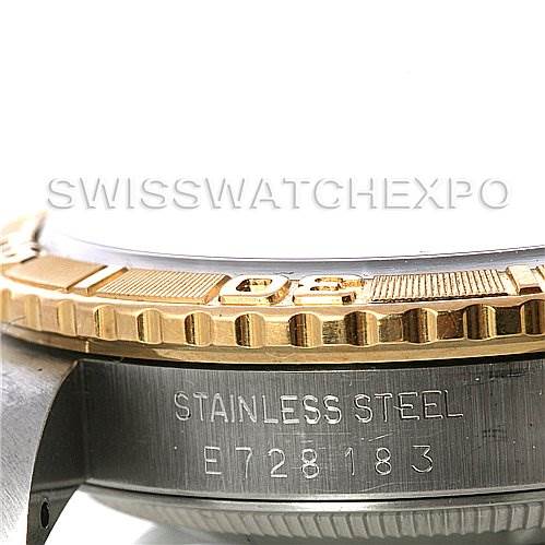The image shows a close-up of the side view of a Rolex Turn-o-Graph 16263 Men's Steel and Gold (two tone) Silver Dial 16263 Men's Steel and Gold (two tone) Silver Dial watch, focusing on the stainless steel case and gold bezel.