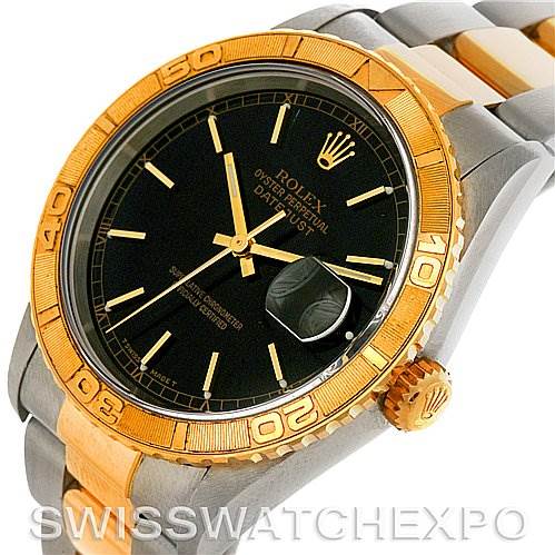 The image shows a Rolex Turn-o-Graph 16263 Men's Steel and Gold (two tone) Black Dial 16263 Men's Steel and Gold (two tone) Black Dial watch with a black dial, gold bezel, and two-tone bracelet, viewed from a slight angle.