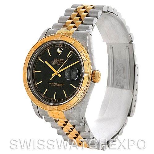 This image shows a side-angle view of the Rolex Turn-o-Graph 16263 Men's Steel and Gold (two tone) Black Dial 16263 Men's Steel and Gold (two tone) Black Dial watch, highlighting the bezel, dial, and two-tone bracelet.