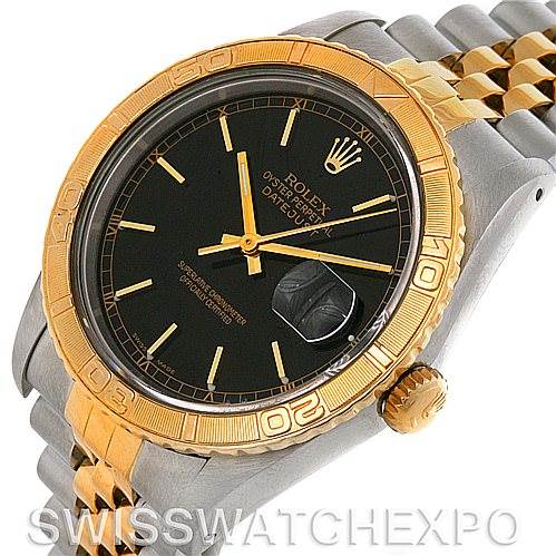 The image shows a Rolex Turn-o-Graph 16263 Men's Steel and Gold (two tone) Black Dial 16263 Men's Steel and Gold (two tone) Black Dial watch from an angled top view, highlighting the bezel, dial, crown, bracelet, and date window.