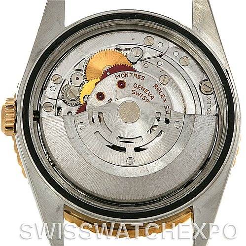 The image shows the exposed back of a Rolex Turn-o-Graph 16263 Men's Steel and Gold (two tone) Black Dial 16263 Men's Steel and Gold (two tone) Black Dial watch, revealing its intricate mechanical movement.