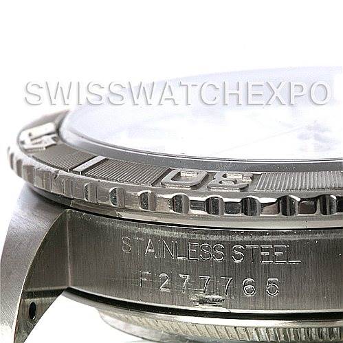 This image shows a close-up side angle of the bezel and stainless steel case of a Rolex Turn-o-Graph 16264 Men's Stainless Steel White Dial 16264 Men's Stainless Steel White Dial watch.