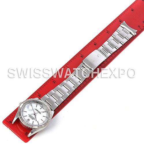 The image shows a top-down view of a Rolex Turn-o-Graph 16264 Men's Stainless Steel White Dial 16264 Men's Stainless Steel White Dial watch and its bracelet alongside a red ruler for scale.