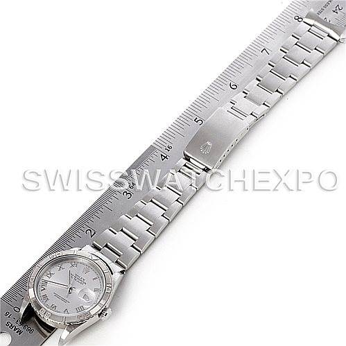The image shows an overhead view of a Rolex Turn-o-Graph 16264 Men's Stainless Steel Silver Dial 16264 Men's Stainless Steel Silver Dial watch laid flat next to a ruler, displaying the dial, bracelet, and clasp.