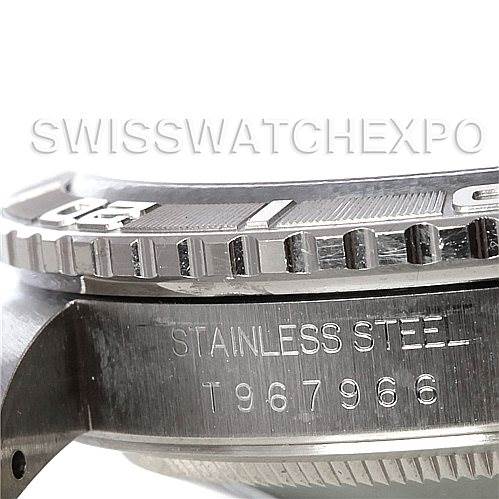 The image shows a close-up side view of the bezel and case of a Rolex Turn-o-Graph 16264 Men's Stainless Steel Black Dial 16264 Men's Stainless Steel Black Dial watch, focusing on the stainless steel material and serial number.