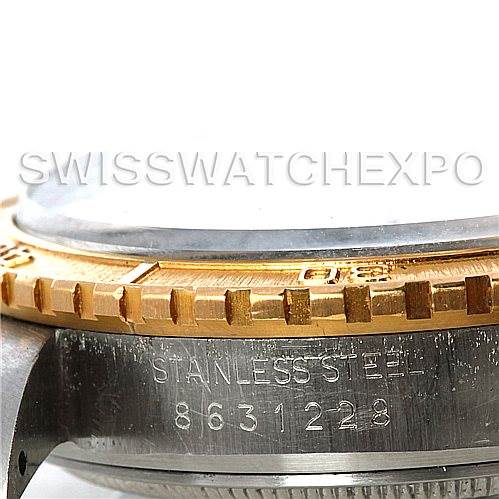 This image shows a close-up of the side view of a Rolex Turn-o-Graph 16263 Men's Steel and Gold (two tone) Champagne Dial 16263 Men's Steel and Gold (two tone) Champagne Dial model watch, focusing on the case and bezel with engraved details.