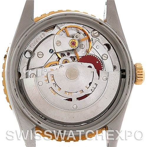 The image shows the back view of a Rolex Turn-o-Graph 16263 Men's Steel and Gold (two tone) Champagne Dial 16263 Men's Steel and Gold (two tone) Champagne Dial watch, revealing its intricate internal movement.