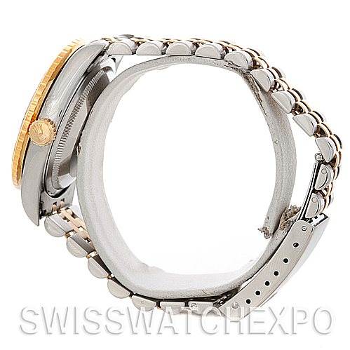 This Rolex Turn-o-Graph 16263 Men's Steel and Gold (two tone) Blue Dial 16263 Men's Steel and Gold (two tone) Blue Dial watch is shown from the side, highlighting the case, crown, bezel, and bracelet.