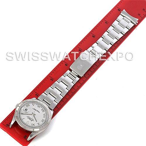 The Rolex Turn-o-Graph 16264 Men's Stainless Steel Silver Dial 16264 Men's Stainless Steel Silver Dial watch is shown in an overhead view, laid flat with a red ruler for scale.