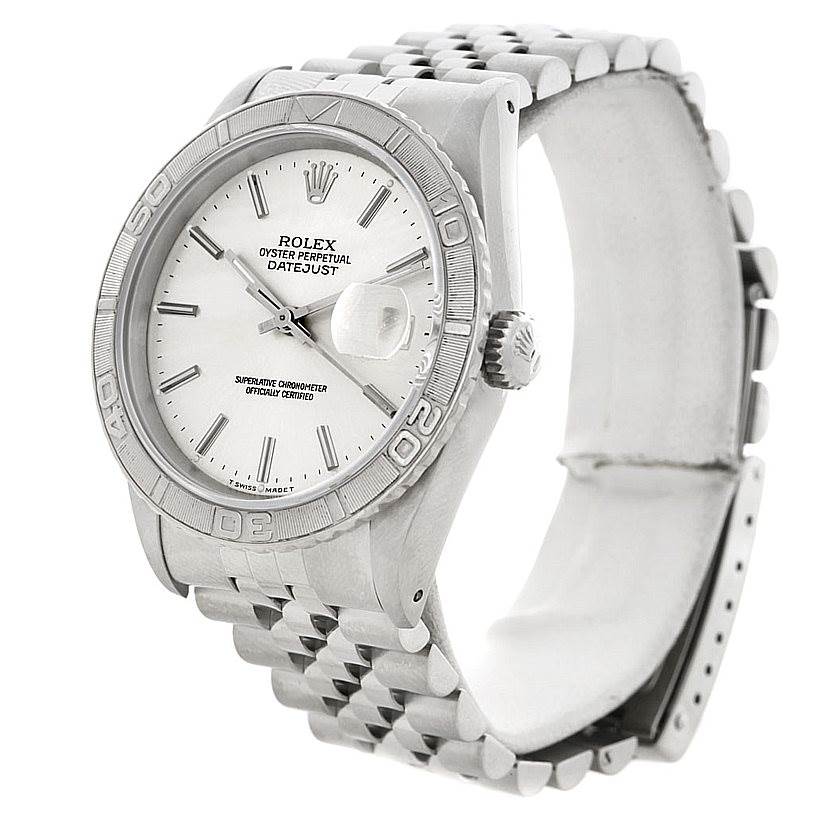 The Rolex Turn-o-Graph 16264 Men's Stainless Steel White Dial 16264 Men's Stainless Steel White Dial watch is shown at an angled side view, displaying the face, bezel, crown, and part of the bracelet.