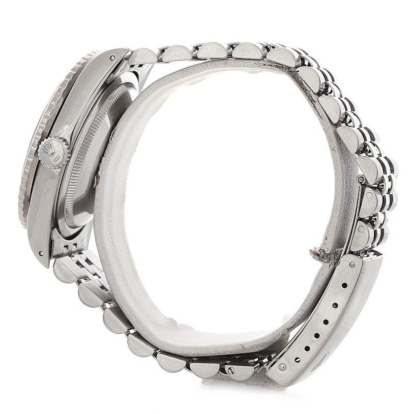 The Rolex Turn-o-Graph 16264 Men's Stainless Steel White Dial 16264 Men's Stainless Steel White Dial watch is shown from a side angle, highlighting its bezel, crown, and bracelet details.