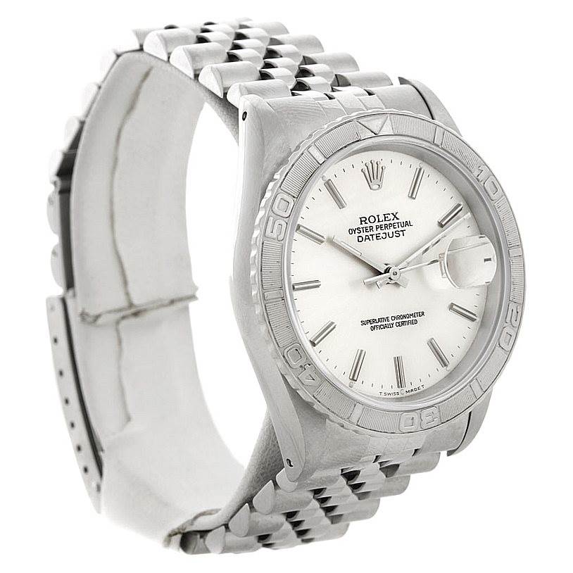This image shows a Rolex Turn-o-Graph 16264 Men's Stainless Steel White Dial 16264 Men's Stainless Steel White Dial model watch at an angled side view, highlighting its bezel, bracelet, and face.