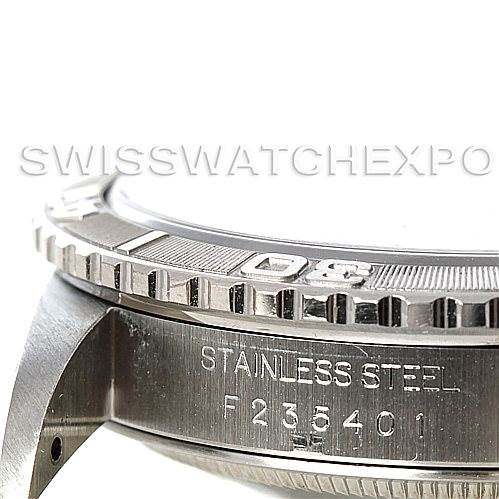 This image shows a close-up of the bezel and case, revealing the serial number and stainless steel marking on the Rolex Turn-o-Graph 16264 Men
s Stainless Steel Black Dial 16264 Men
s Stainless Steel Black Dial watch.