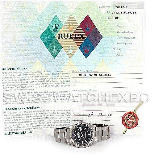 The image shows a Rolex Turn-o-Graph 16264 Men
s Stainless Steel Black Dial 16264 Men
s Stainless Steel Black Dial watch displayed with warranty papers and certification, viewed from the front.