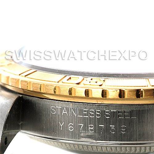 This image shows a close-up of the side of a Rolex Turn-o-Graph 16263 Men's Steel and Gold (two tone) Grey Dial 16263 Men's Steel and Gold (two tone) Grey Dial watch, highlighting the bezel and stainless steel casing with a serial number.