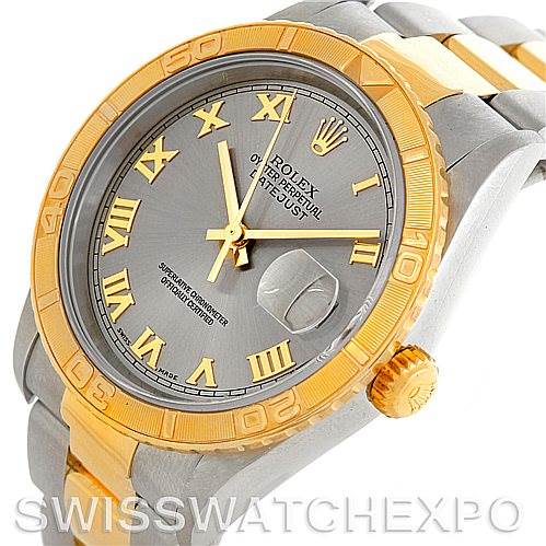 This image shows a close-up angle of the Rolex Turn-o-Graph 16263 Men's Steel and Gold (two tone) Grey Dial 16263 Men's Steel and Gold (two tone) Grey Dial watch featuring the face, bezel, dial, and part of the bracelet.