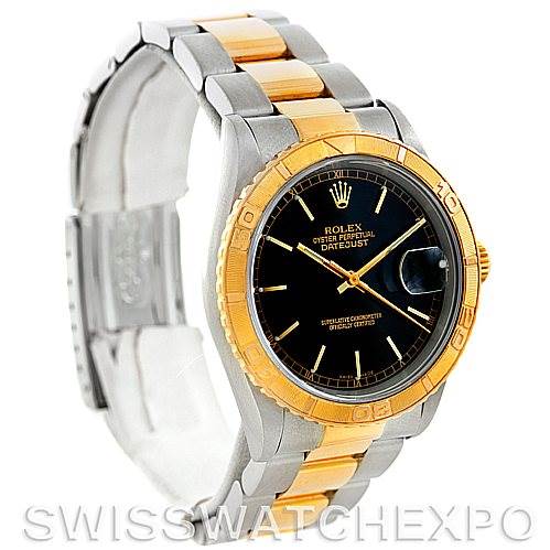 This Rolex Turn-o-Graph 16263 Men's Steel and Gold (two tone) Black Dial 16263 Men's Steel and Gold (two tone) Black Dial watch is shown at an angle displaying its face, bezel, crown, and bracelet.