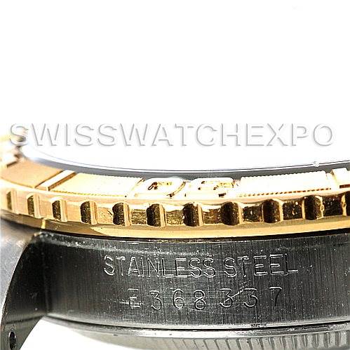 The image shows a close-up side view of the bezel and case of a Rolex Turn-o-Graph 16263 Men's Steel and Gold (two tone) Blue Dial 16263 Men's Steel and Gold (two tone) Blue Dial watch, highlighting the stainless steel and serial number.