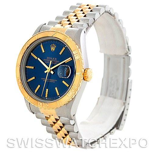 The Rolex Turn-o-Graph 16263 Men's Steel and Gold (two tone) Blue Dial 16263 Men's Steel and Gold (two tone) Blue Dial watch is shown at a slight angle, highlighting its blue dial, gold bezel, and two-tone bracelet.