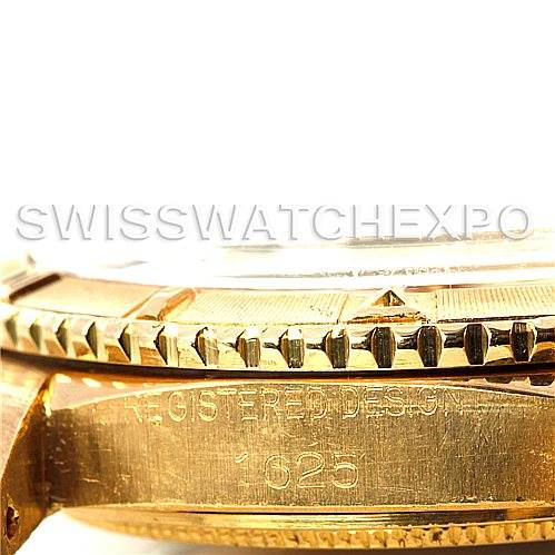 This is a close-up side view of a Rolex Turn-o-Graph 1625 Men's Yellow Gold Champagne Dial 1625 Men's Yellow Gold Champagne Dial watch showing the bezel and part of the case with engraved text.