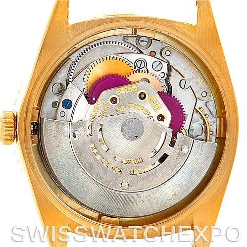 The image shows the open case back and exposed movement of the Rolex Turn-o-Graph 1625 Men's Yellow Gold Champagne Dial 1625 Men's Yellow Gold Champagne Dial watch.