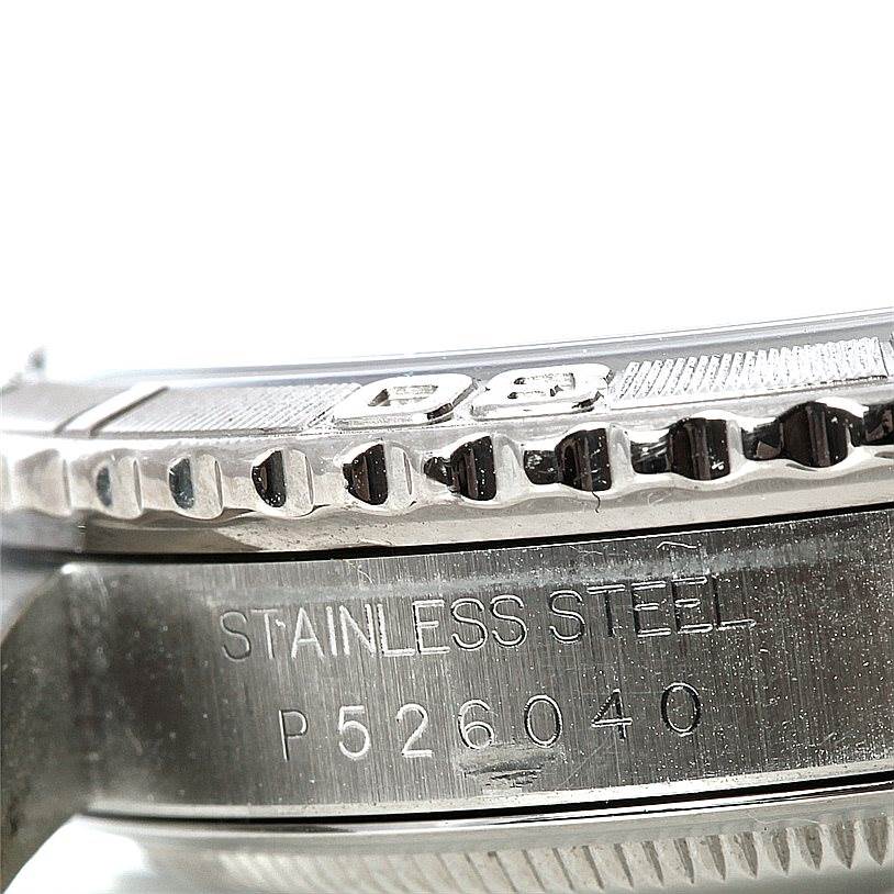 The image shows a close-up view of the side of the case and bezel on a Rolex Turn-o-Graph 16264 Men's Stainless Steel Silver Dial 16264 Men's Stainless Steel Silver Dial watch, highlighting the stainless steel material and serial number.