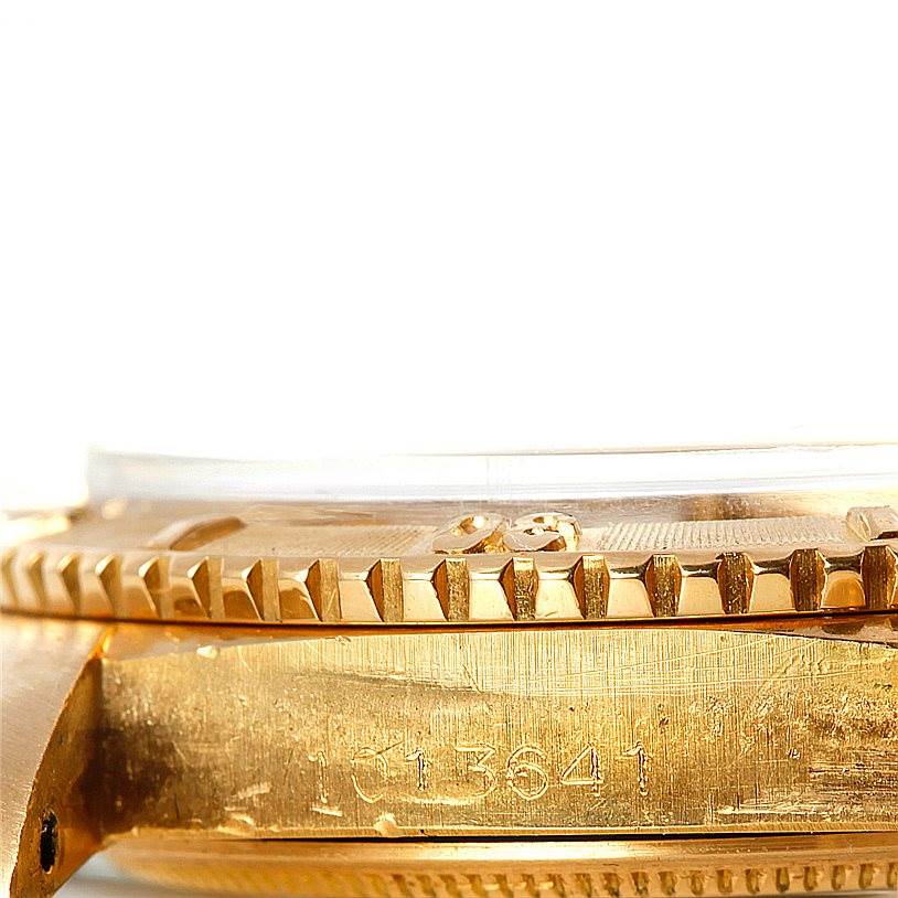 This image shows a close-up side view of the bezel and part of the case of a Rolex Turn-o-Graph 1625 Men's Yellow Gold Champagne Dial 1625 Men's Yellow Gold Champagne Dial watch.