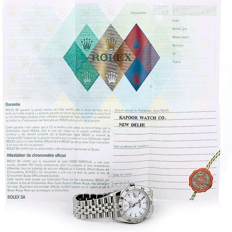 The image shows a Rolex Turn-o-Graph 116264 Men's Stainless Steel White Dial 116264 Men's Stainless Steel White Dial watch displayed with its warranty and official documents.