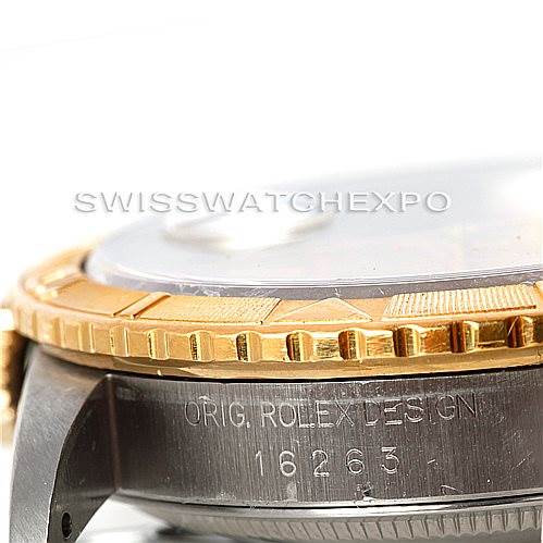 This image shows a close-up side view of a Rolex Turn-o-Graph 16263 Men's Steel and Gold (two tone) Champagne Dial 16263 Men's Steel and Gold (two tone) Champagne Dial watch, highlighting its gold bezel and engraved case with model number 16263.