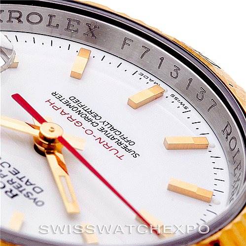 This image shows a close-up of the dial, hands, and part of the bezel of a Rolex Turn-o-Graph 116263 Men's Stainless Steel White Dial 116263 Men's Stainless Steel White Dial watch.