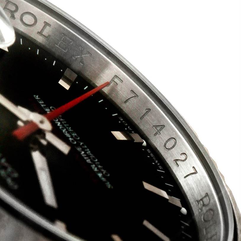 The close-up angle shows the partial face and bezel with engraved markings of the Rolex Turn-o-Graph 116264 Men
s Stainless Steel Black Dial 116264 Men
s Stainless Steel Black Dial watch.