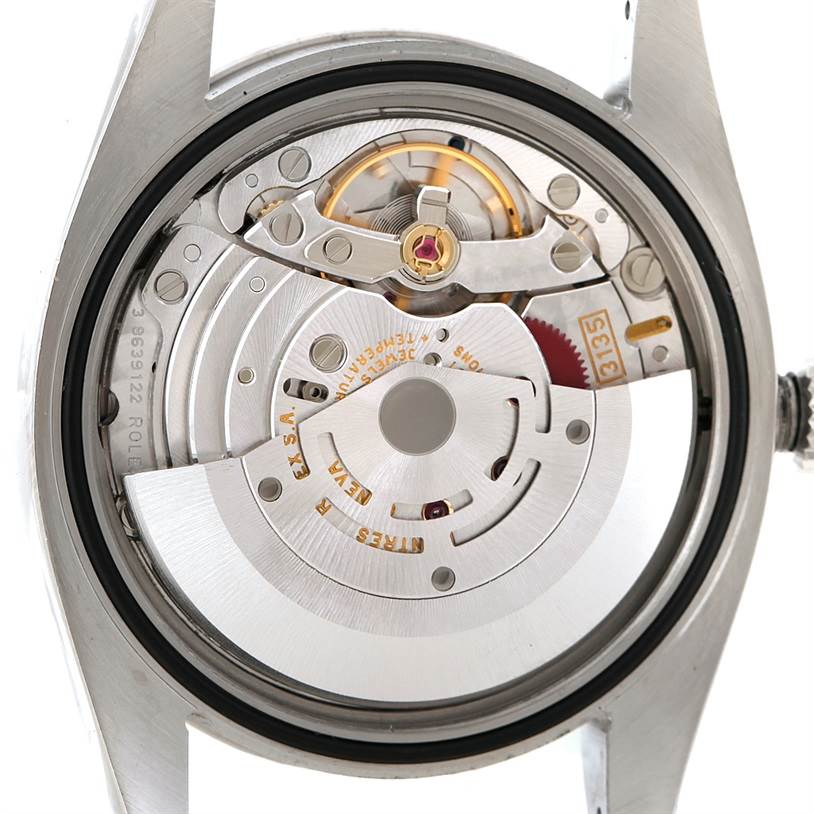 This image shows the back of a Rolex Turn-o-Graph 116264 Men
s Stainless Steel Black Dial 116264 Men
s Stainless Steel Black Dial watch, focusing on its movement and internal mechanisms.