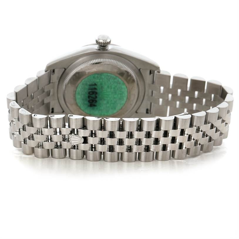 The image shows the back view of a Rolex Turn-o-Graph 116264 Men
s Stainless Steel Black Dial 116264 Men
s Stainless Steel Black Dial watch, focusing on the stainless steel bracelet and case back.