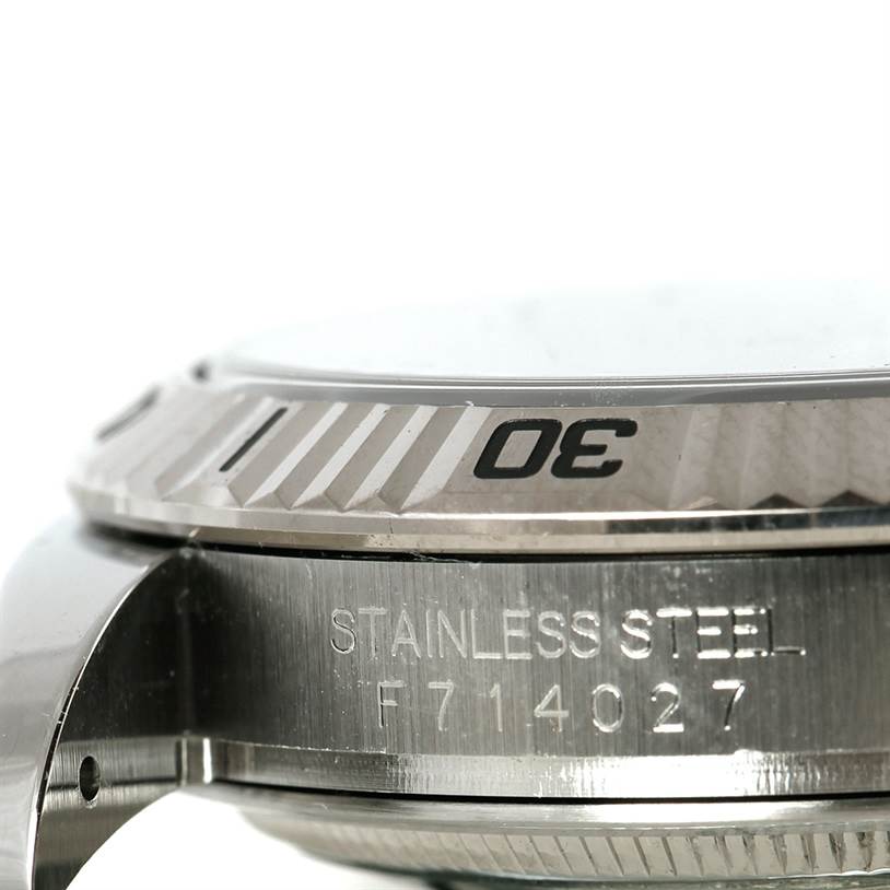 The image shows a close-up side view of the stainless steel case and rotating bezel of the Rolex Turn-o-Graph 116264 Men
s Stainless Steel Black Dial 116264 Men
s Stainless Steel Black Dial watch.
