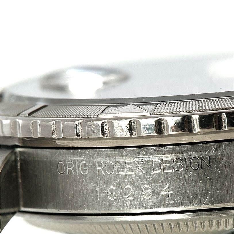 The image shows a close-up side view of the bezel and case edge of a Rolex Turn-o-Graph 16264 Men
s Stainless Steel Grey Dial 16264 Men
s Stainless Steel Grey Dial model watch, with the engraving "ORIG ROLEX DESIGN 16264."