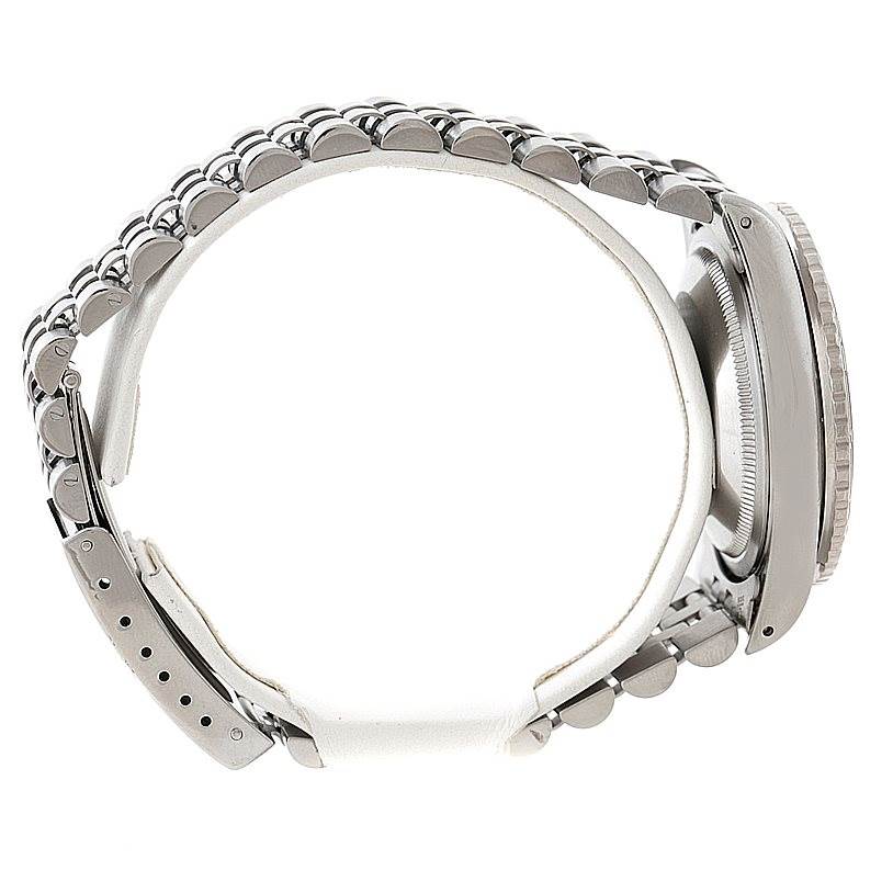 The image shows a side view of a Rolex Turn-o-Graph 16264 Men
s Stainless Steel Grey Dial 16264 Men
s Stainless Steel Grey Dial watch, highlighting its bracelet and partial case.