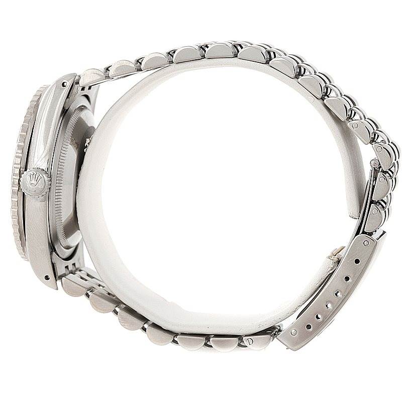 This image shows a side view of a Rolex Turn-o-Graph 16264 Men
s Stainless Steel Grey Dial 16264 Men
s Stainless Steel Grey Dial watch with its metal bracelet partially open.